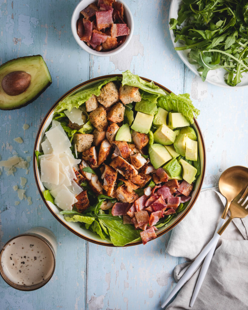 Warm Spiced Chicken and Avocado Bacon Caesar Salad