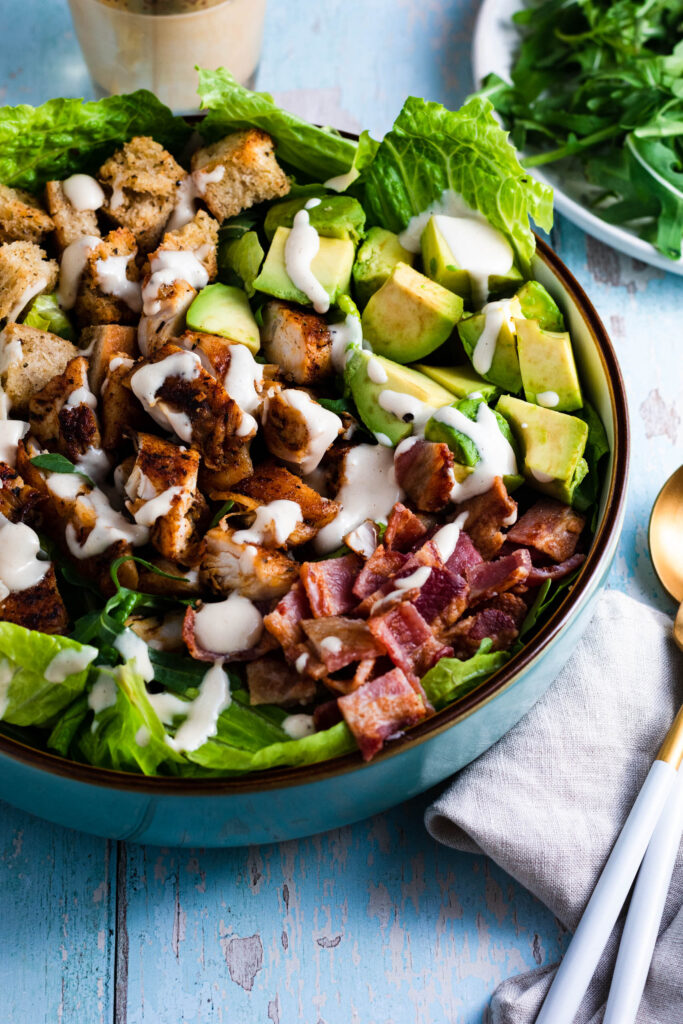 Warm Spiced Chicken and Avocado Bacon Caesar Salad